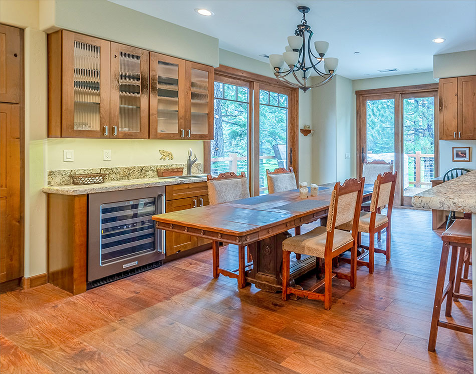 Dining room and wet bar with views of the golf course